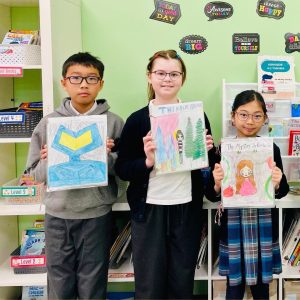 HongDe students with their own books: school project