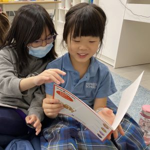 Students reading to each other